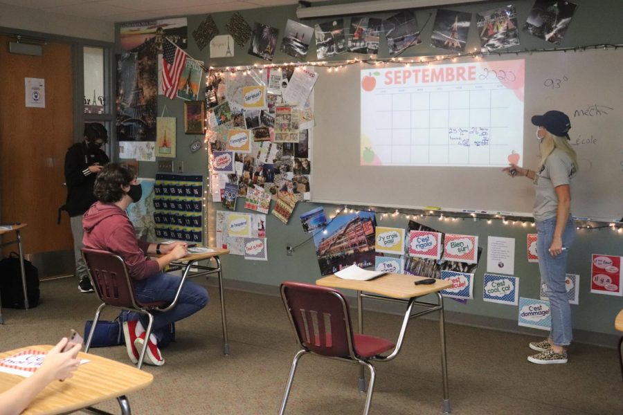 Jennifer Kerr, Maize South High's French teacher, teaches her fourth block students the days of the week with a French  calendar. 