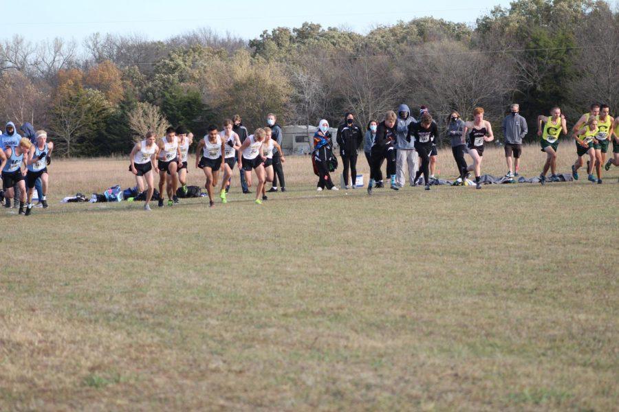 Before starting their race, the Maize South boys cross country team prepares to run a four mile course for the KSHAA State Championship.  The boys finished the race in sixth place, Austin Schaffer finishing in the top 20.  