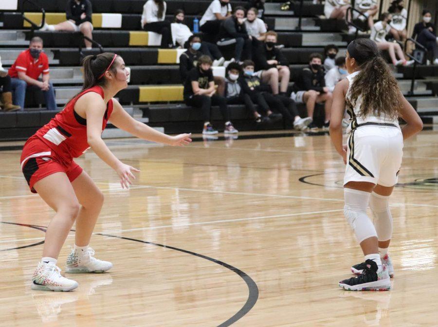 Piper McCann, 10, looks to find a teammate around the perimeter as she sets up the offensive play in the second half for the Lady Mavericks.
