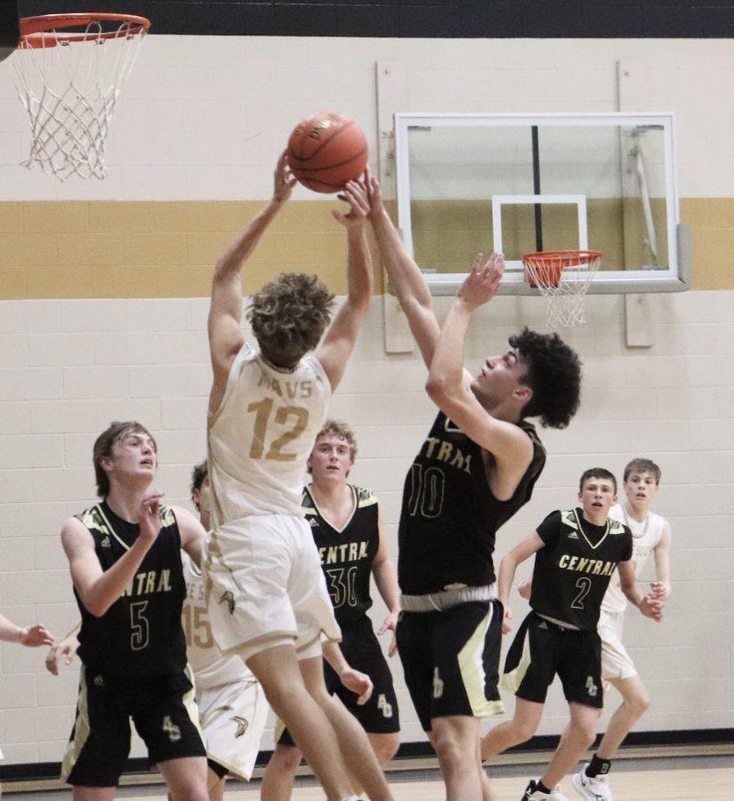 Photo by Sydney Endicott

Sophomore Levi Harden goes up for the shot against heavy defense in the paint. The Junior varsity squad would prevail in the 4th quarter and win 55-51 on the night.