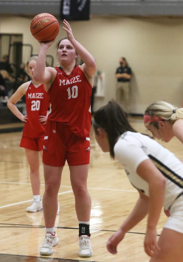 Senior Sydney Holmes shoots a free throw after being fouled in the fourth quarter. The Lady Eagles won with a final score of 51-31 against Maize South.