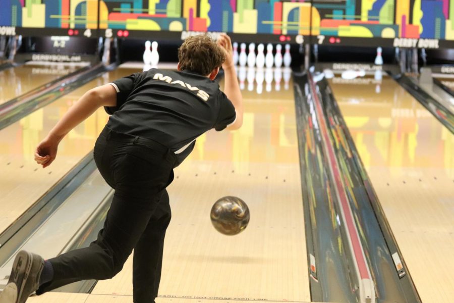 Carter Bowles throws the bowling ball towards the pin at Derby, Kansas