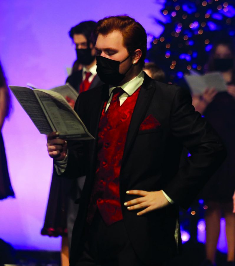 Senior Gavin Wright sings at the choirs Christmas concert, in which only photographers ad recorders were allowed.
