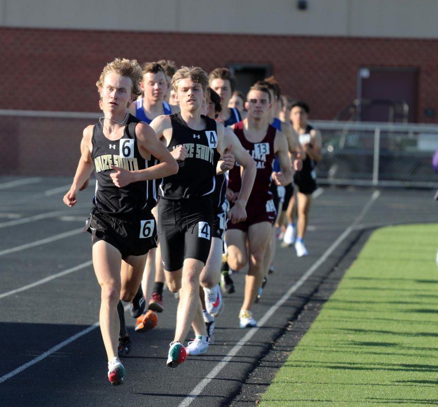 Junior Vaughn Decker and junior Austin Schaeffer pace themselves in the middle of their 1600 meter run. Schaeffer finished with a time of 4 minutes and 28 seconds also receiving a 1st place title while Vaughn ran a time of 4 minutes and 36 seconds. Both runners combined scored 14 points for the Mavericks team total. 
