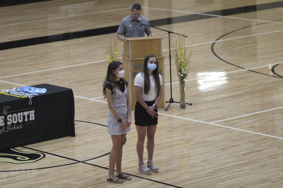 Alexa Rios and Riley Kennedy step up in front of their class as co-winners of girls athlete of the year. The girls tied in terms of winning the award individually, so each of them won an award of $X