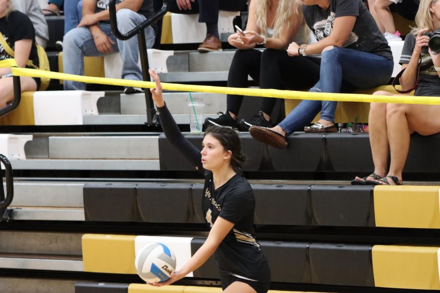 Senior Rachel Butts on the serving line ready to spike the ball to the opponents side of the court. The Lady Mavericks are 18-5 overall and has 12.0 kills per set. On Tuesday, Sept 21 at the Maize South main gym. 