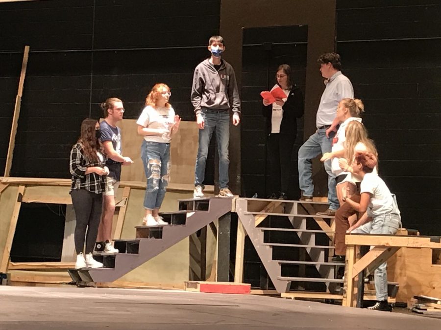 Rehearsing+the+second+half+of+show+while+practicing+blocking+in+the+MHS+auditorium%2C+Katelyn+Coffey+%2809%29%2C+Caden+Cauthon+%2812%29%2C+Marrisa+Dowell+%2812%29%2C+Dashall+Meyer+%2810%29%2C+Alexis+Winegarner+%2812%29%2C+Warren+Swedberg+%2812%29%2C+Jaden+Murdock+%2810%29%2C+Kinsley+Morrison+%2811%29%2C+Liliana+Cabrera+%2812%29+work+on+how+the+cast+will+leave+the+set+for+a+scene+on+Monday%2C+Oct.+11.