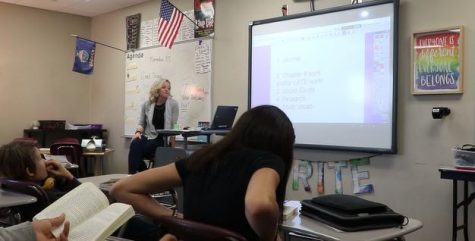 English teacher Sarah Crumrine guides students through a lesson at Maize Middle School.