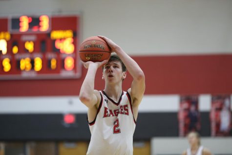 Senior Kyle Grill shoots a basket during the fourth quarter. Maize defeated Maize South 71-57. 