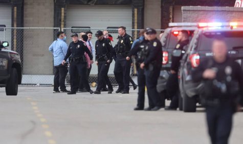 Police investigate a shooting at Towne East Square on March 19. A 14 year old boy was killed. Maize South junior Vanessa Carey was working at the time of the shooting. 