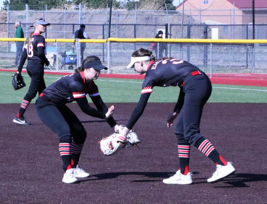 Junior Kennedy Topping and Sophomore Brynley Smith celebrate after a great defensive inning. Lady Eagles lead 3-0 and keep them scoreless.