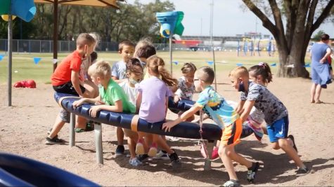 Elementary school children at Vermillion Elementary come together on the playground for the USD 266 Virtual Tour video showcase on Monday, Oct. 4.