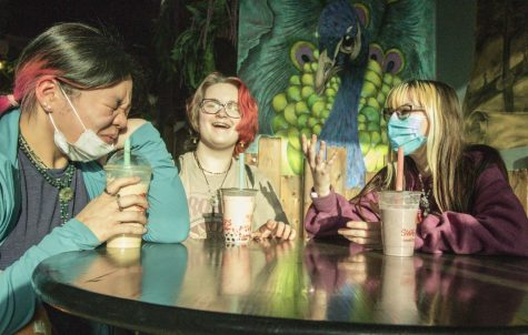 Laura Shum (left) enjoys boba with her friends, Alex Koopmann (middle) and Janae Simpson (right) as they talk about their days and catch up. Koopmann and Simpson were two of Shums first friends in Maize and to this day are still her closest friends.