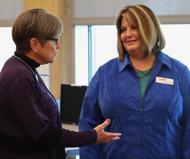 Governor Laura Kelly visits with the  Assistant Superintendent of Teaching and Learning, Beth Parker regarding mental heath in the Maize community. After talking to an extensive group of USD 266 representatives, Governor Kelly addressed individual concerns about specific issues in the district.
