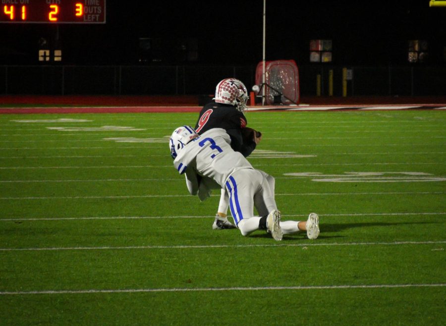 Senior Bryce Cohoon reeling in his second catch of the night. Maize defeated Kapaun 43-14 Friday night.