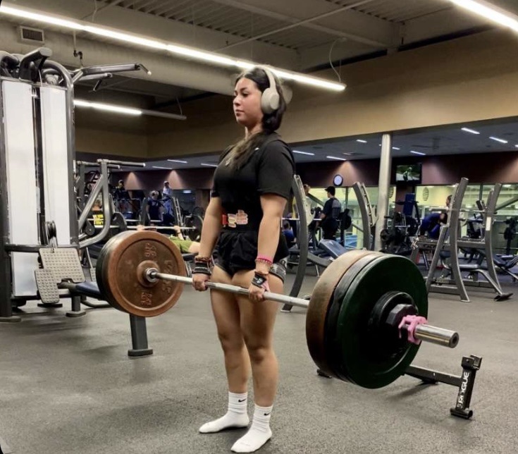 Grace Rubio deadlifts over 300 pounds at the Northwest YMCA on Tuesday, Dec. 13. Her other leg lifts include squats, leg press, leg extensions and stretches before and after her workouts.