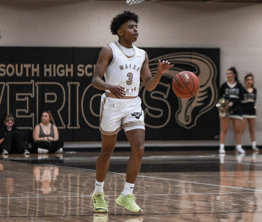 Senior point guard Isaiah Atwater brings the ball up the court for the Mavericks second possession of the game. Despite having such a high points per game average, Atwater also averages 4.6 assists per game. Maize South defeated the Goddard Lions 63-30 Tuesday night.