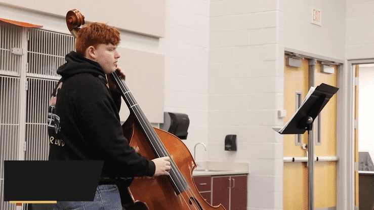 Video: Maize South orchestra spreads holiday cheer through their community tour
