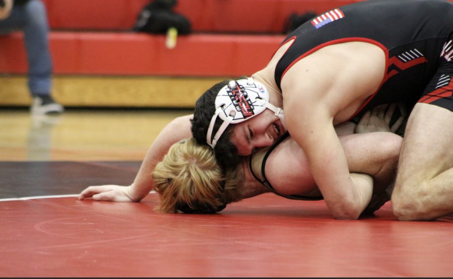 Senior Connor Padgett pressuring his opponent from Newton. Maize wrestling is ranked #1 in the AVCTL division after defeating the #2 spot Newton. 