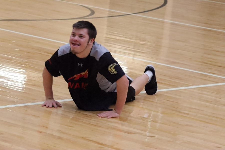 Sophomore Jacob Rempel performs the worm for the crowd . He entertained the fans throughout all of halftime.

