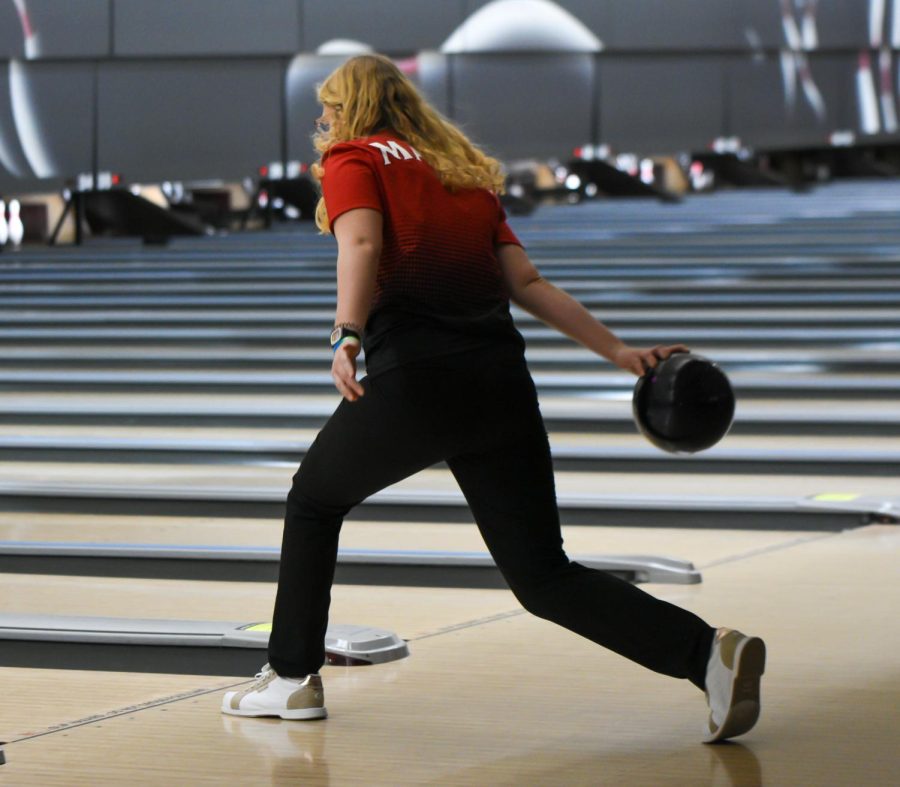 Senior Emma Kohl shoots a spare in the tenth frame of a bakers game. Kohl had a 305 series with an average of 102. The Eagles placed 29th overall in the tournament.