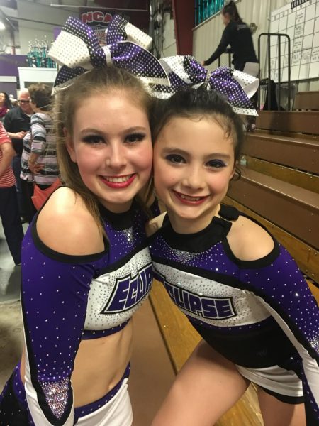 Carys Mauldin and Remington Young cheering together. Mauldin helped with raising money for theorganization Love Like Remi in her honor.