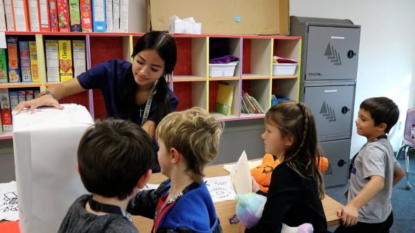 Maize and Maize South Elementary students participating in an activity with their teddy bears.