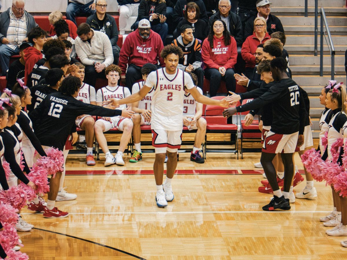 Photos: Boys win, girls lose as Eagles face Hutch